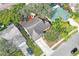 Aerial view of the home, backyard deck, and surrounding neighborhood at 6315 Shane Ln, New Port Richey, FL 34653