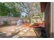 Backyard features a deck, stone path, and landscaping at 6315 Shane Ln, New Port Richey, FL 34653