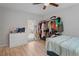 Comfortable bedroom features a spacious closet, hardwood floors, and great natural light at 6315 Shane Ln, New Port Richey, FL 34653
