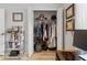 Walk-in closet with double doors, built in shelving and organized storage space at 6315 Shane Ln, New Port Richey, FL 34653
