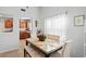 Dining area with table set and view into kitchen at 6315 Shane Ln, New Port Richey, FL 34653