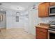 Spacious kitchen area with ample counter space, and stainless steel appliances at 6315 Shane Ln, New Port Richey, FL 34653