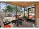 Relaxing screened lanai with a view of the patio and backyard at 6315 Shane Ln, New Port Richey, FL 34653
