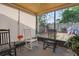 Relaxing screened lanai with comfortable seating and a view of the outdoor patio and backyard at 6315 Shane Ln, New Port Richey, FL 34653