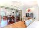 Home office sunroom featuring a sliding glass door and outdoor views at 7392 Willow Brook Dr, Spring Hill, FL 34606