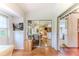 Bright sunroom featuring sliding glass doors to additional living spaces at 7392 Willow Brook Dr, Spring Hill, FL 34606