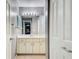Bathroom featuring vanity with sink, mirror, and medicine cabinet at 7802 Hardwick Dr # 1116, New Port Richey, FL 34653