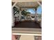 Relaxing gazebo featuring benches for seating and views of the community and parking area at 7802 Hardwick Dr # 1116, New Port Richey, FL 34653