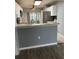 Bright kitchen featuring stone countertops, stainless steel appliances, and modern fixtures at 7802 Hardwick Dr # 1116, New Port Richey, FL 34653