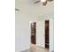 Convenient in-unit laundry closet featuring a stacked washer and dryer for efficient space saving at 7802 Hardwick Dr # 1116, New Port Richey, FL 34653