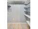 Spacious pantry with adjustable shelving, offering ample storage for groceries and household items at 7802 Hardwick Dr # 1116, New Port Richey, FL 34653