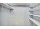 Spacious pantry with adjustable shelving, offering ample storage for groceries and household items at 7802 Hardwick Dr # 1116, New Port Richey, FL 34653