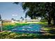 Outdoor shuffleboard court on the community property for fun activities at 7802 Hardwick Dr # 1116, New Port Richey, FL 34653