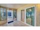 Cozy sunroom offering access to both the interior and a private patio at 7802 Hardwick Dr # 1116, New Port Richey, FL 34653