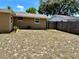 View of the backyard featuring a partially fenced area at 7861 Raintree Dr, New Port Richey, FL 34653