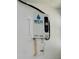 Tankless water heater mounted on a wall, providing efficient hot water on demand at 7861 Raintree Dr, New Port Richey, FL 34653