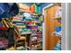 Organized closet featuring shelves stacked high with board games and ample storage at 8102 Fort Dade Ave, Brooksville, FL 34601