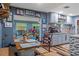 Cozy dining area featuring a wooden table and chairs, with views of the backyard at 8102 Fort Dade Ave, Brooksville, FL 34601