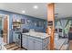 Bright, open-concept with stainless appliances, leading to the living space at 8102 Fort Dade Ave, Brooksville, FL 34601