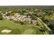 An aerial view of a charming home at 8132 Summersong Ct, Spring Hill, nestled on a beautiful golf course at 8132 Summersong Ct, Spring Hill, FL 34606