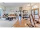 Open living area featuring hardwood floors, comfortable seating, and decorative lighting at 8132 Summersong Ct, Spring Hill, FL 34606
