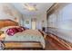 Serene primary bedroom with a king-sized bed and stylish décor at 8132 Summersong Ct, Spring Hill, FL 34606