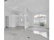 Bright entryway with neutral color palette, tile floors, and an arched window at 8228 Coral Creek Loop, Hudson, FL 34667