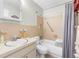 Functional bathroom including a shower and bathtub combo, a toilet, and vanity with sink at 8405 112Th St # 103, Seminole, FL 33772