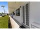 Clean and well-maintained exterior walkway leading to the unit entrance, offering a welcoming appeal at 8405 112Th St # 103, Seminole, FL 33772