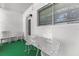 Comfortable screened porch with outdoor seating at 8405 112Th St # 103, Seminole, FL 33772