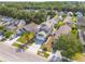 Aerial view of the house showing the front yard, driveway, and surrounding neighborhood at 8526 Hawbuck St, Trinity, FL 34655