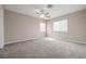 Bedroom featuring neutral walls, ceiling fan and carpet flooring at 8526 Hawbuck St, Trinity, FL 34655