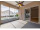 Covered lanai that overlooks the swimming pool, creating a relaxing and private outdoor space at 8526 Hawbuck St, Trinity, FL 34655