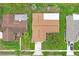 High angle picture of a house in a neighborhood, demonstrating proximity to nearby homes at 8700 Wind Mill Dr, New Port Richey, FL 34655