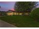 Charming home with a manicured lawn and mature tree at 8700 Wind Mill Dr, New Port Richey, FL 34655