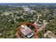Expansive aerial view of property, showing pool and surrounding landscape at 9152 Bunting Rd, Weeki Wachee, FL 34613