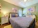 Inviting bedroom with nautical decor, comfortable bedding, and ample natural light at 9152 Bunting Rd, Weeki Wachee, FL 34613
