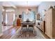 Formal dining room featuring hardwood floors, chandelier, and an open layout at 9152 Bunting Rd, Weeki Wachee, FL 34613