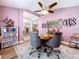 Dining area with unique decor, comfortable seating, and a stylish ceiling fan at 9152 Bunting Rd, Weeki Wachee, FL 34613