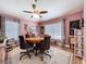 Game room featuring hardwood floors, artwork, cozy vibe, and ceiling fan at 9152 Bunting Rd, Weeki Wachee, FL 34613