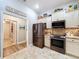 Modern kitchen featuring stainless steel appliances and ample cabinet space at 9152 Bunting Rd, Weeki Wachee, FL 34613