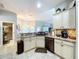 Bright kitchen featuring stainless steel appliances and granite countertops at 9152 Bunting Rd, Weeki Wachee, FL 34613