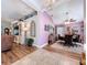 Open-concept living space featuring dining room, living room, and a vaulted ceiling at 9152 Bunting Rd, Weeki Wachee, FL 34613