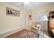 Comfortable bedroom with plush carpet and classic decor at 9161 Southern Comfort Ct, Weeki Wachee, FL 34613