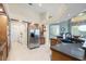 This kitchen boasts stainless steel appliances, stone countertops, and plenty of storage at 9161 Southern Comfort Ct, Weeki Wachee, FL 34613