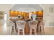 Kitchen featuring a granite countertop with barstool seating at 9161 Southern Comfort Ct, Weeki Wachee, FL 34613