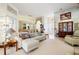 Spacious living room with open floor plan, ample seating, and tasteful decor at 9161 Southern Comfort Ct, Weeki Wachee, FL 34613
