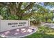 An inviting community sign at Seven Springs Golf and Country Club at 9622 Brassie Ct # 9, New Port Richey, FL 34655