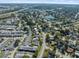 Aerial view of the community showcasing the serene pond and lush greenery at 9891 52Nd N St, Pinellas Park, FL 33782