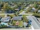 Aerial view of the property with a fire pit, storage shed and an in-ground pool at 9891 52Nd N St, Pinellas Park, FL 33782